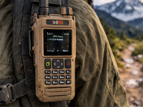 BTECH UV-PRO GPS radio attached to an outdoor backpack